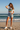 Skeleton Bonfire Tee – White, Denim Shorts Beach