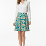 Skirt with white button-up blouse and nude heels