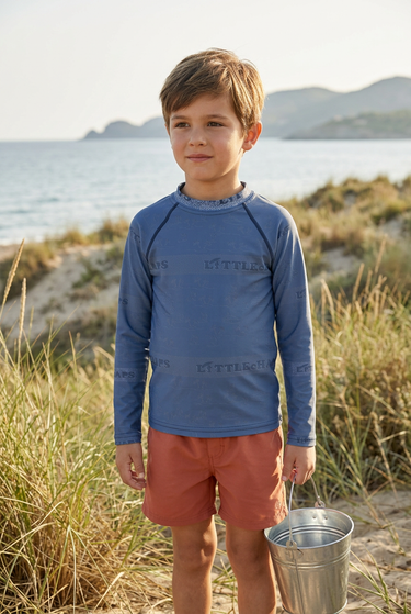 Slate-blue rash guard editorial look
