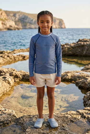 Slate-blue rash guard editorial look