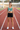 Sports bra running-track editorial