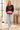 Sunlit apartment look with light-wash jeans