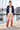 Sunset joggers with cropped navy jacket at marina