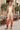 Sunset joggers with silk blouse and camel jacket