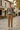 Sweater styled with camel trousers