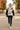 Sweater with black leggings