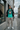 Teal T-shirt with bomber jacket and cargos