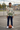 Teen boy wearing the woodland hoodie on a sports court