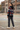 Teen girl showing the hoodie back on a sports court
