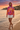 Tie-dye hoodie styled for a beach walk