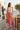 Tie-dye joggers styled at a coastal café