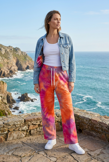 Tie-dye joggers styled with a denim jacket