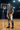 Track pants styled on an indoor basketball court