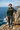 Trailhunter hoodie with charcoal cargo trousers at an ocean overlook