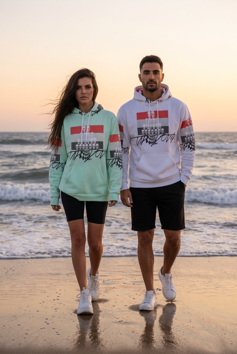 Vertical sunset beach editorial featuring both hoodie models