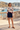 Wave sweater with tailored navy shorts