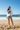 White — Denim Shorts on Beach