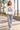 White surf-van sweatshirt on a female model