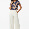 Wide-Leg Pants & Statement Jewelry
