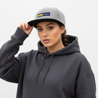 Woman in gray snapback
