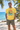 Yellow SURFXION T-shirt with rocky-outcrop model