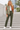 Your model wearing the split-dye bomber with tailored olive trousers